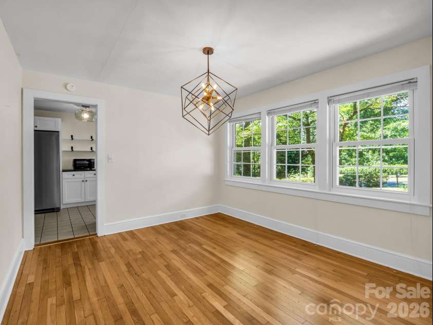117 Whitney Avenue, Tryon, NC 28782.  MLS# CAR4400518, YatesRealty ID 42984. Dining room with easy access to the kitchen