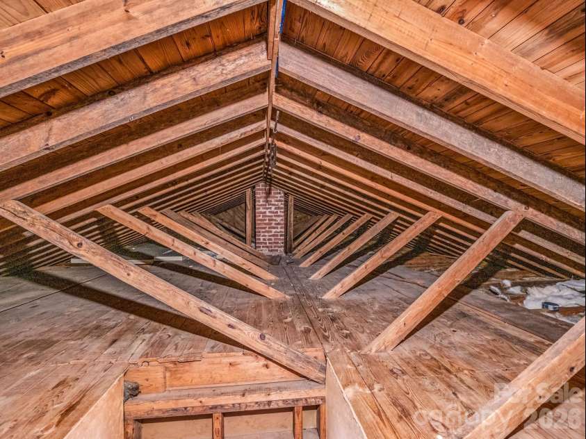 117 Whitney Avenue, Tryon, NC 28782.  MLS# CAR4400518, YatesRealty ID 42984. Floored walk-up attic