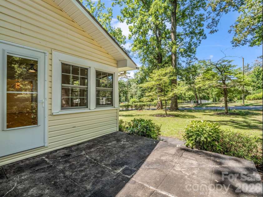 117 Whitney Avenue, Tryon, NC 28782.  MLS# CAR4400518, YatesRealty ID 42984. Front patio faces Whitney Ave