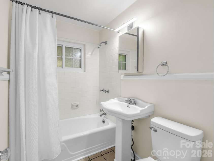 117 Whitney Avenue, Tryon, NC 28782.  MLS# CAR4400518, YatesRealty ID 42984. Guest bathroom