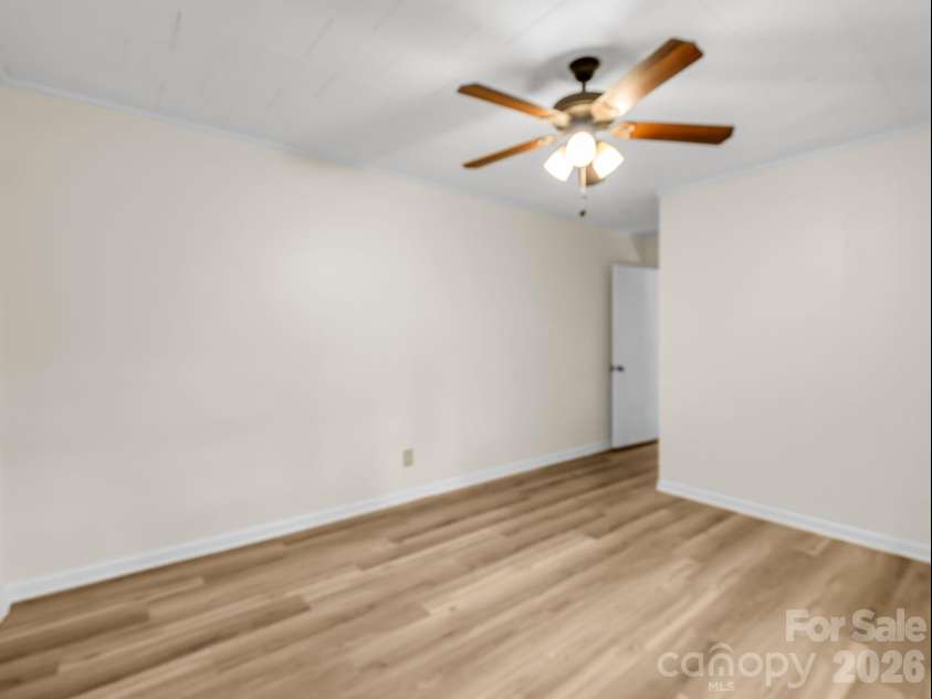117 Whitney Avenue, Tryon, NC 28782.  MLS# CAR4400518, YatesRealty ID 42984. Primary bedroom