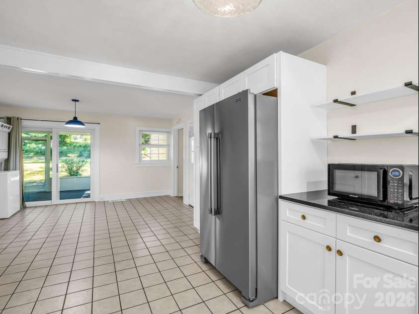 117 Whitney Avenue, Tryon, NC 28782.  MLS# CAR4400518, YatesRealty ID 42984. Tile flooring in the kitchen
