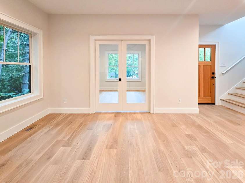 505 Oconeechee Avenue, Black Mountain, NC 28711.  MLS# CAR4399162, YatesRealty ID 42987. Office doors directly off living