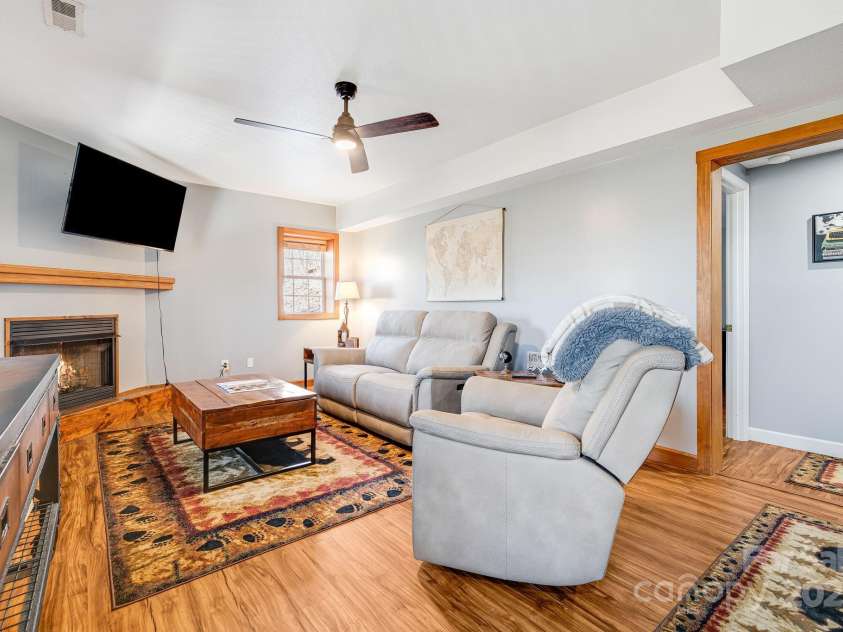 110 Red Wolf Lane, Mars Hill, NC 28754.  MLS# CAR4239848, YatesRealty ID 4299. Downstairs living room