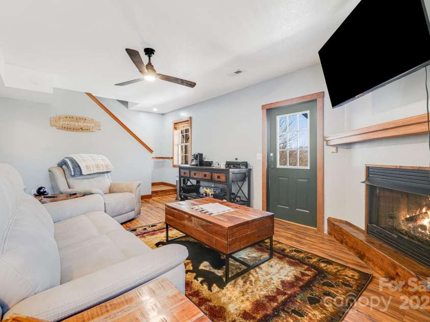 110 Red Wolf Lane, Mars Hill, NC 28754.  MLS# CAR4239848, YatesRealty ID 4299. Downstairs living room