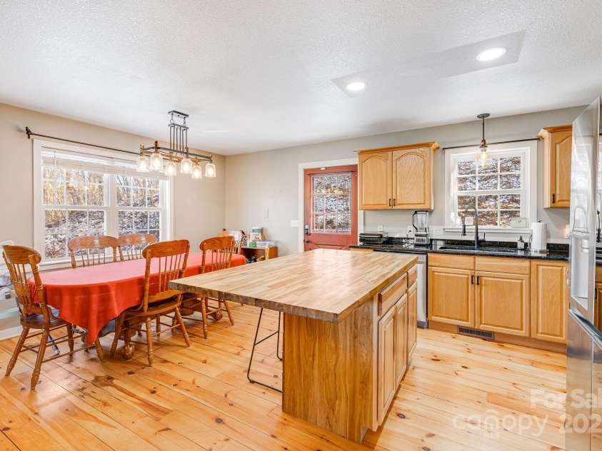 110 Red Wolf Lane, Mars Hill, NC 28754.  MLS# CAR4239848, YatesRealty ID 4299. Kitchen and dining area