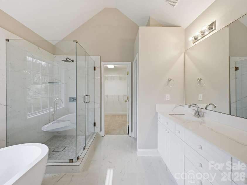 9701 Julliard Drive, Mint Hill, NC 28227.  MLS# CAR4344353, YatesRealty ID 4299. Primary Bathroom w/Enlcosed Glass Shower