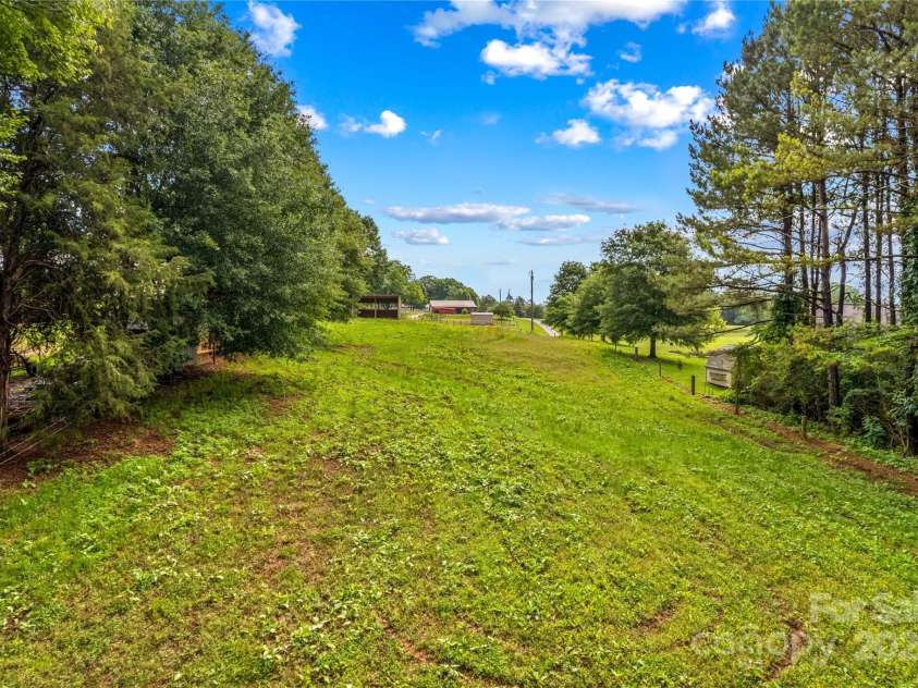 296 Hicks Creek Road, Troutman, NC 28166.  MLS# CAR4266143, YatesRealty ID 430. Fenced Pasture