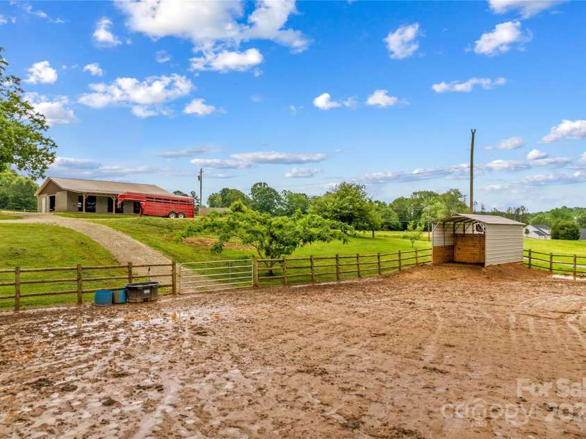 296 Hicks Creek Road, Troutman, NC 28166.  MLS# CAR4266143, YatesRealty ID 430. Sand Base Footing