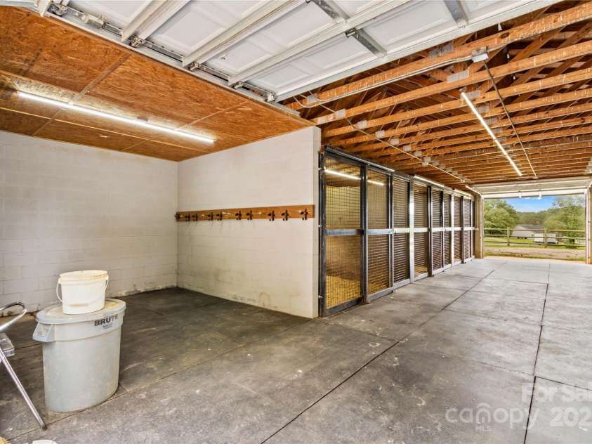 296 Hicks Creek Road, Troutman, NC 28166.  MLS# CAR4266143, YatesRealty ID 430. Tack Storage & Wash Stall 