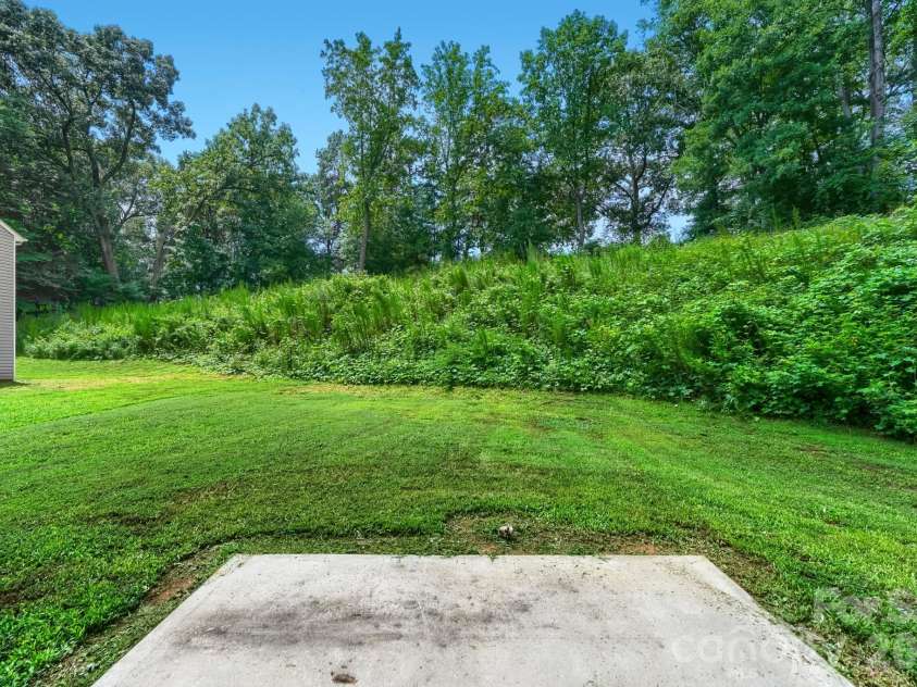 244 Valleybrook Lane, Troutman, NC 28166.  MLS# CAR4411289, YatesRealty ID 43004. Backyard
