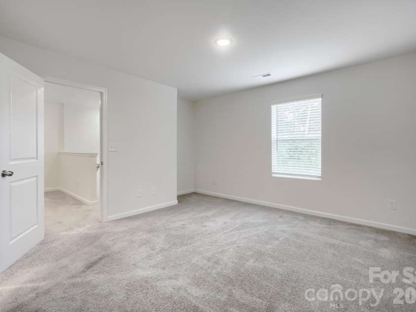 244 Valleybrook Lane, Troutman, NC 28166.  MLS# CAR4411289, YatesRealty ID 43004. Primary Bedroom