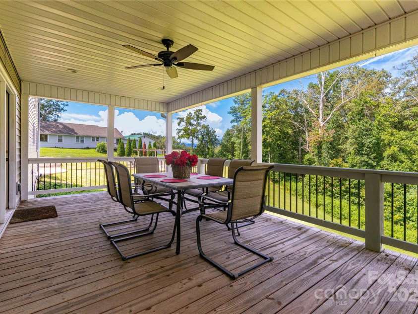 460 Panther Branch Road, Alexander, NC 28701.  MLS# CAR4293485, YatesRealty ID 4301. Covered Back Porch 