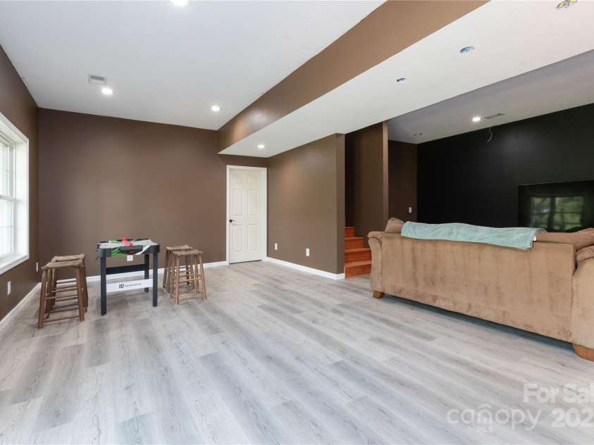 460 Panther Branch Road, Alexander, NC 28701.  MLS# CAR4293485, YatesRealty ID 4301. Game Room Space 