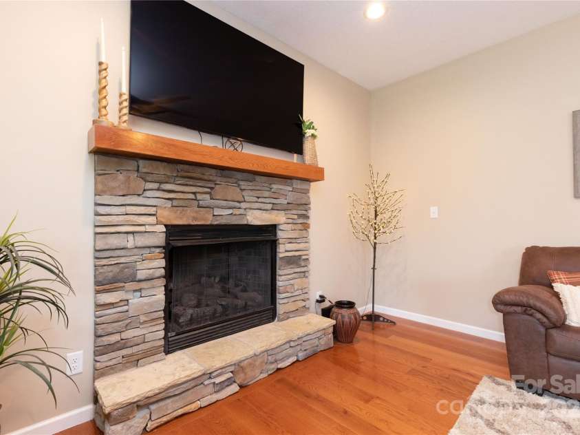 460 Panther Branch Road, Alexander, NC 28701.  MLS# CAR4293485, YatesRealty ID 4301. Rock Fireplace with gas logs
