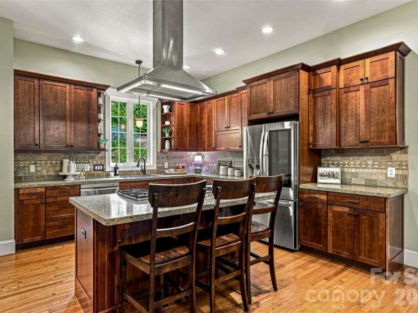 90 Ashley Woods Drive, Arden, NC 28704.  MLS# CAR4392883, YatesRealty ID 43011. Center Island and spacious storage