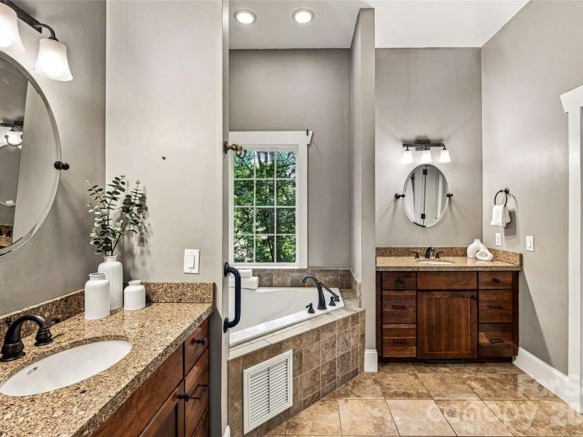 90 Ashley Woods Drive, Arden, NC 28704.  MLS# CAR4392883, YatesRealty ID 43011. Primary En-suite dual sinks