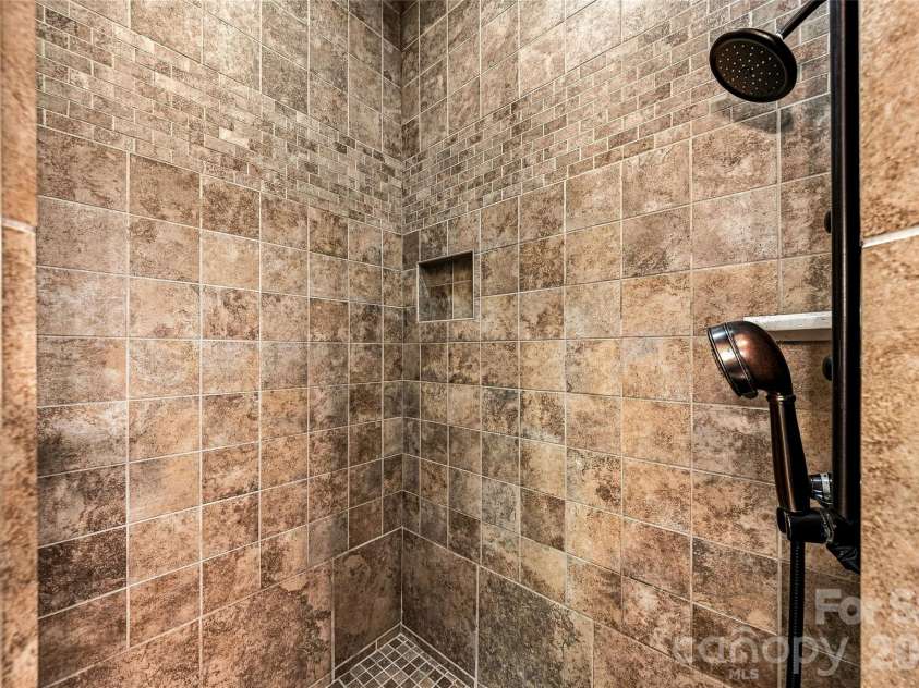 90 Ashley Woods Drive, Arden, NC 28704.  MLS# CAR4392883, YatesRealty ID 43011. Primary walk-in shower