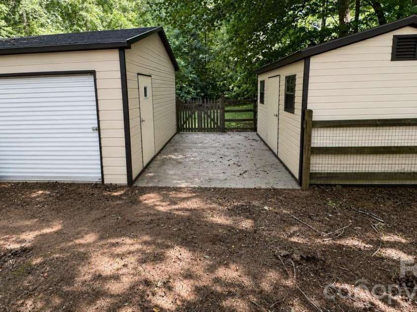 3775 Kennedy Road, Gastonia, NC 28056.  MLS# CAR4406234, YatesRealty ID 43012. Two Large Storage Units