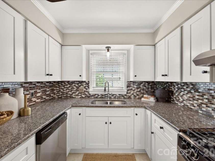 1700 Roxborough Road, Charlotte, NC 28211.  MLS# CAR4405926, YatesRealty ID 43013. Kitchen window overlooks Trianon