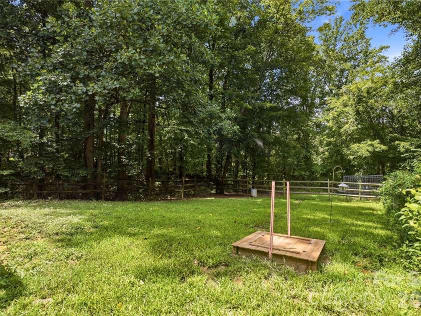 3555 Lake Bluff Drive, Sherrills Ford, NC 28673.  MLS# CAR4405905, YatesRealty ID 43024. Sand box in backyard off deck