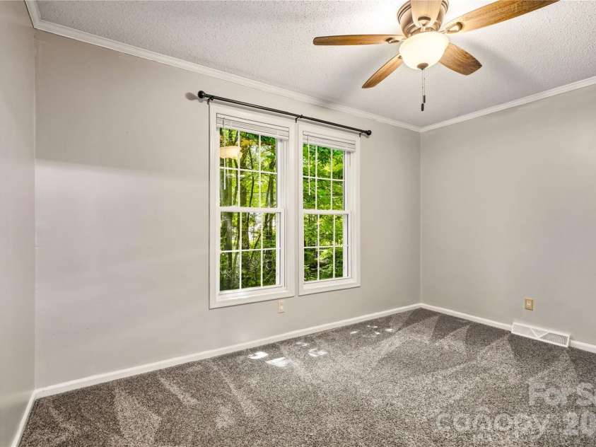 3555 Lake Bluff Drive, Sherrills Ford, NC 28673.  MLS# CAR4405905, YatesRealty ID 43024. Second bedroom with ceiling fan