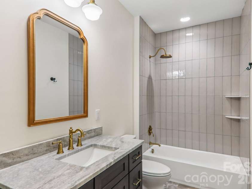 318 Mountain Home Trail, Brevard, NC 28712.  MLS# CAR4405578, YatesRealty ID 43041. 4th bath attached to bedroom 3
