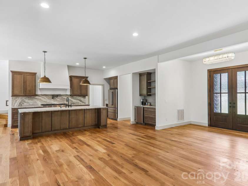 318 Mountain Home Trail, Brevard, NC 28712.  MLS# CAR4405578, YatesRealty ID 43041. Kitchen and entry