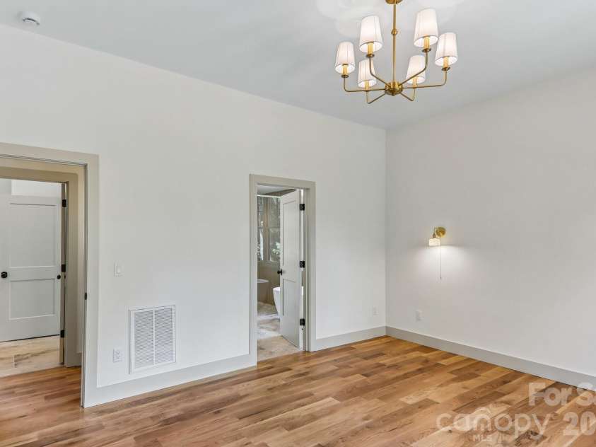 318 Mountain Home Trail, Brevard, NC 28712.  MLS# CAR4405578, YatesRealty ID 43041. Primary bedroom