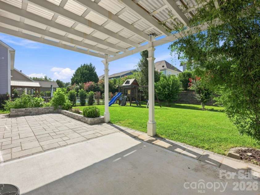 127 Tomahawk Drive, Mooresville, NC 28117.  MLS# CAR4408280, YatesRealty ID 43045. Covered Patio