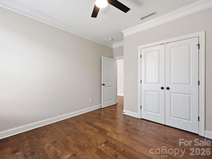127 Tomahawk Drive, Mooresville, NC 28117.  MLS# CAR4408280, YatesRealty ID 43045. Guest Bedroom on Main Level