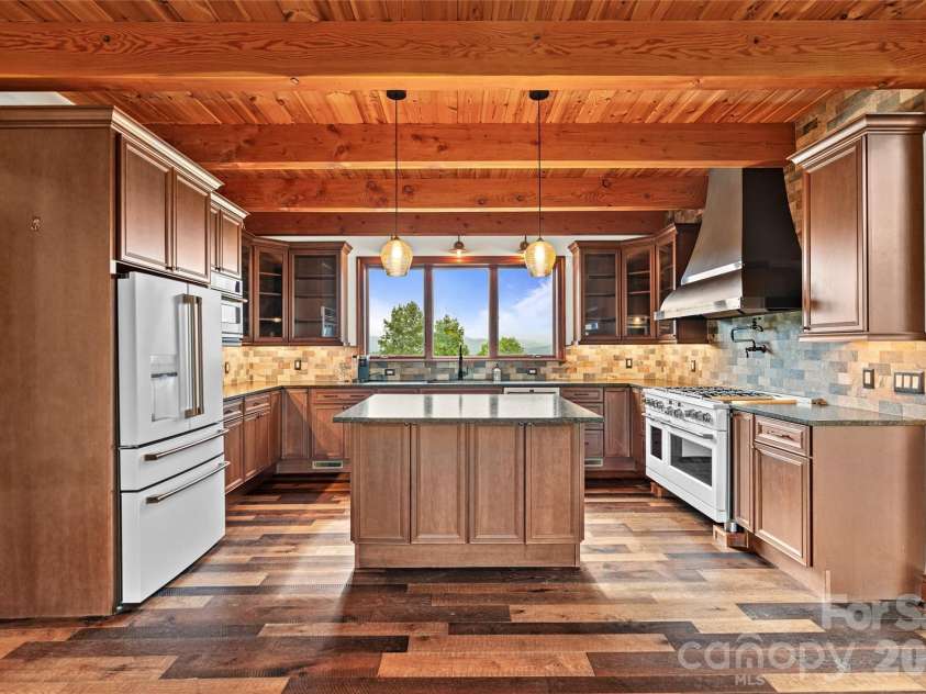 946 Ridge Road, Green Mountain, NC 28740.  MLS# CAR4408714, YatesRealty ID 43047. Chefs kitchen with outstanding views!!