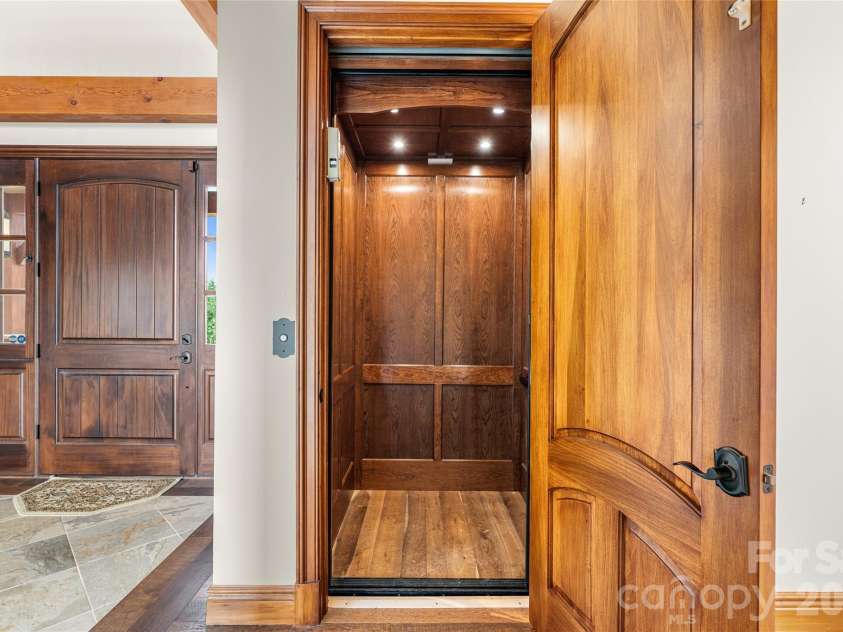 946 Ridge Road, Green Mountain, NC 28740.  MLS# CAR4408714, YatesRealty ID 43047. Elevator that accesses all floors!