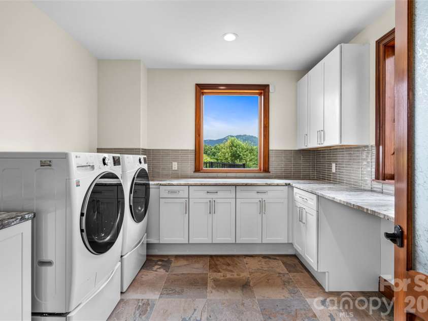 946 Ridge Road, Green Mountain, NC 28740.  MLS# CAR4408714, YatesRealty ID 43047. Laundry room on main level