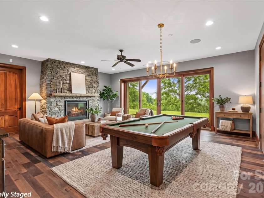 946 Ridge Road, Green Mountain, NC 28740.  MLS# CAR4408714, YatesRealty ID 43047. VIRTUALLY STAGED - Downstairs kitchenette and living space
