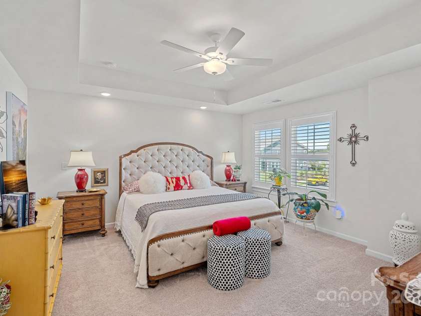 420 Quartz Hill Way, Waxhaw, NC 28173.  MLS# CAR4322228, YatesRealty ID 4305. Your Primary Retreat, With Tray Ceilings, Natural Light, & Fan!
