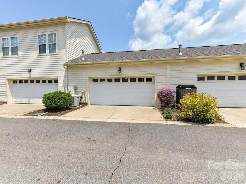 439 O'Henry Avenue, Davidson, NC 28036.  MLS# CAR4409491, YatesRealty ID 43051. 2 car attached, back load garage.