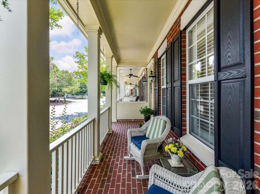 439 O'Henry Avenue, Davidson, NC 28036.  MLS# CAR4409491, YatesRealty ID 43051. Covered Relaxing Front Porch warmly welcomes you.