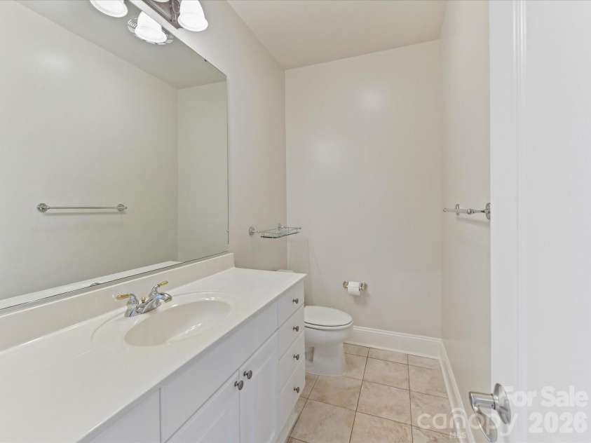 439 O'Henry Avenue, Davidson, NC 28036.  MLS# CAR4409491, YatesRealty ID 43051. Full Bath on upper level with shower & tile floors.