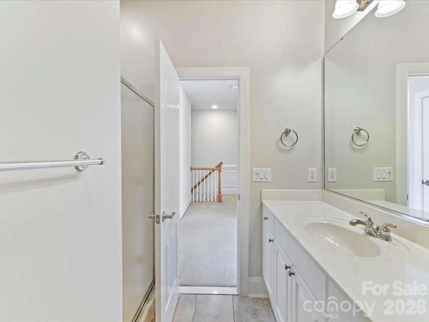 439 O'Henry Avenue, Davidson, NC 28036.  MLS# CAR4409491, YatesRealty ID 43051. Full Bath on upper level with shower & tile floors.