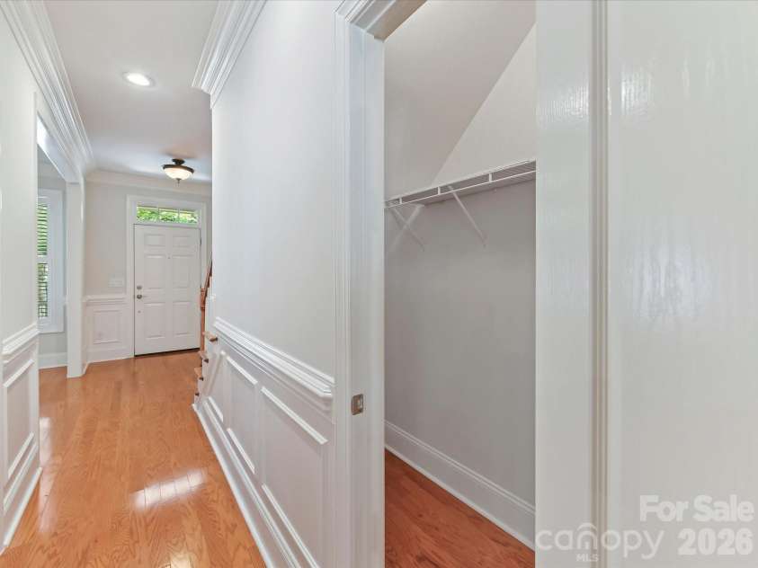 439 O'Henry Avenue, Davidson, NC 28036.  MLS# CAR4409491, YatesRealty ID 43051. Main level walk in closet is incredible for storage.