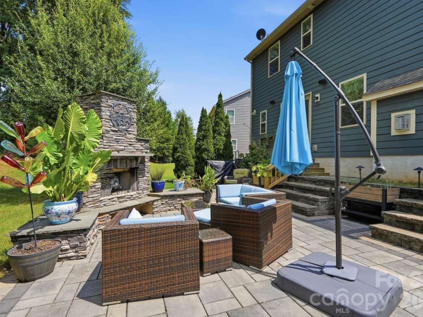 561 Sandbar Point, Clover, SC 29710.  MLS# CAR4412646, YatesRealty ID 43053. Custom outdoor fireplace