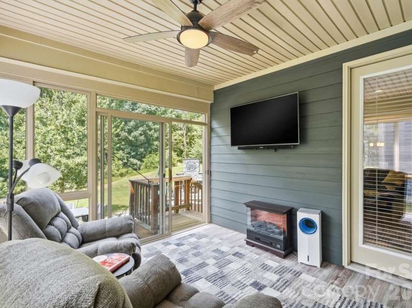 561 Sandbar Point, Clover, SC 29710.  MLS# CAR4412646, YatesRealty ID 43053. Glass Enclosed Sunroom