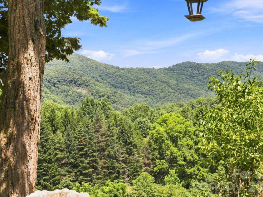 518 Nicholson Cove Road, Cullowhee, NC 28723.  MLS# CAR4411819, YatesRealty ID 43058. 
