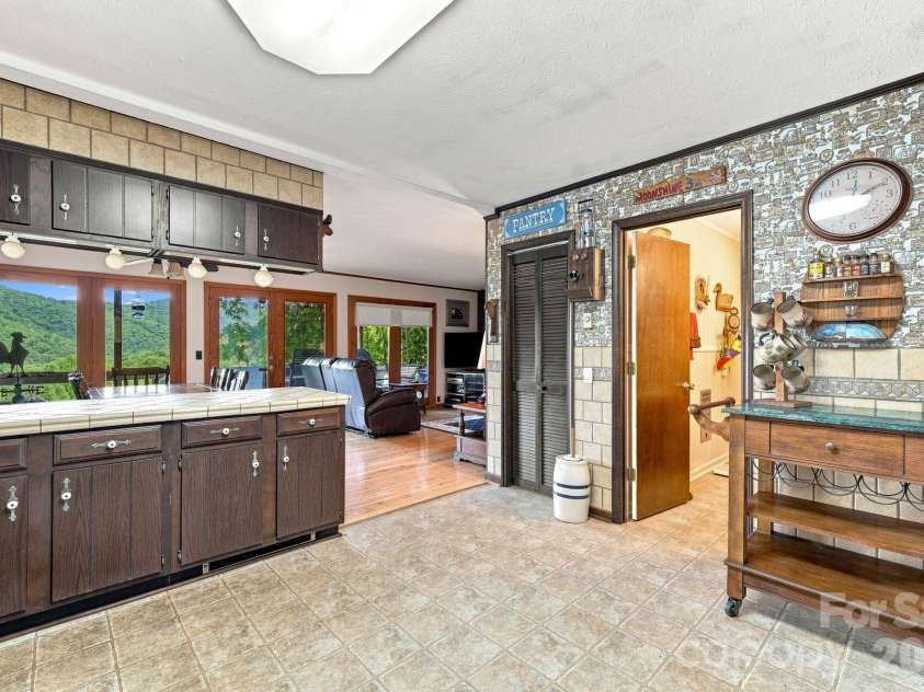 518 Nicholson Cove Road, Cullowhee, NC 28723.  MLS# CAR4411819, YatesRealty ID 43058. 