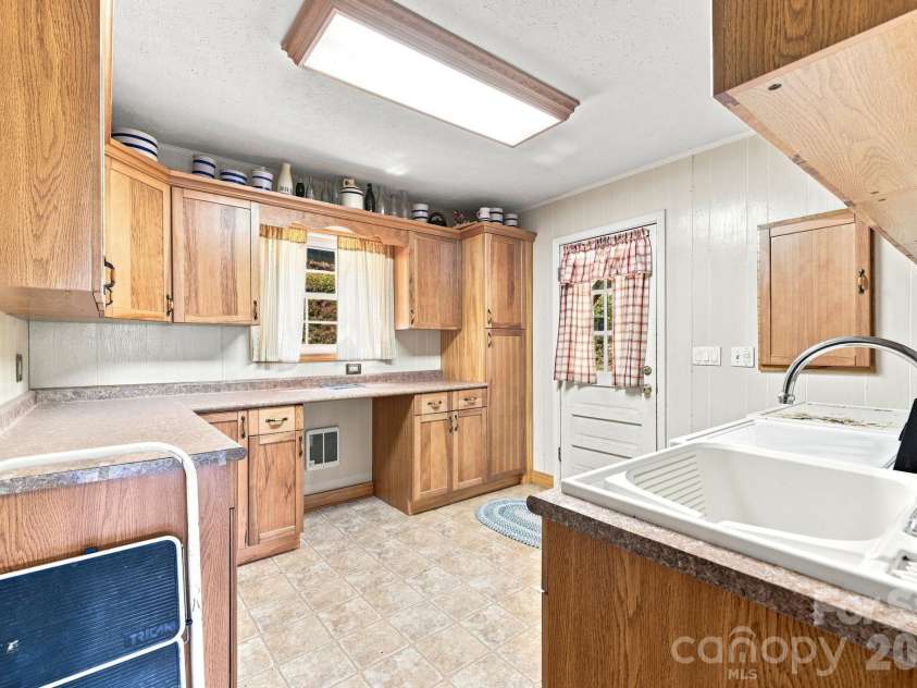 518 Nicholson Cove Road, Cullowhee, NC 28723.  MLS# CAR4411819, YatesRealty ID 43058. 
