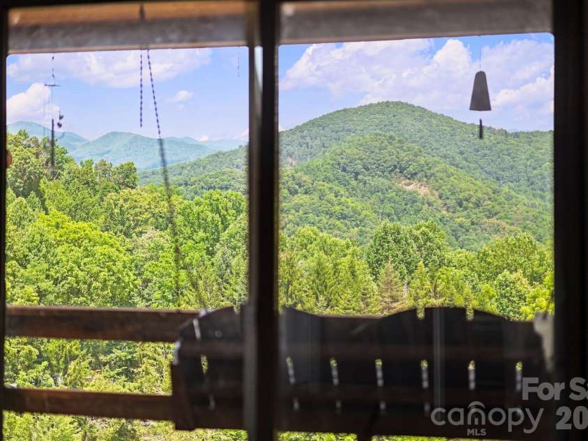 518 Nicholson Cove Road, Cullowhee, NC 28723.  MLS# CAR4411819, YatesRealty ID 43058. 