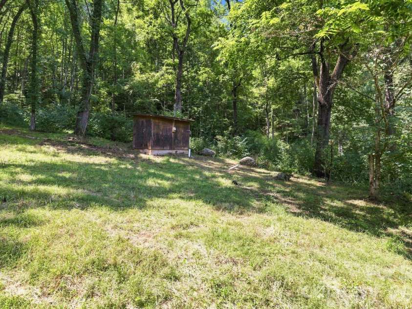 518 Nicholson Cove Road, Cullowhee, NC 28723.  MLS# CAR4411819, YatesRealty ID 43058. 