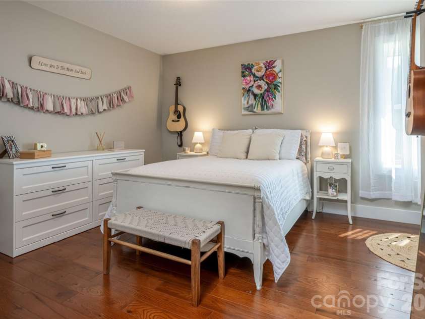 11 Ibbie Roberts Road, Alexander, NC 28701.  MLS# CAR4396356, YatesRealty ID 43060. Guest Room in Lower Level