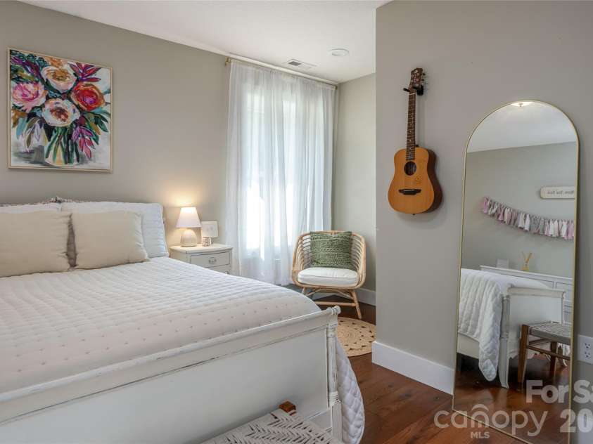 11 Ibbie Roberts Road, Alexander, NC 28701.  MLS# CAR4396356, YatesRealty ID 43060. Guest Room in Lower Level